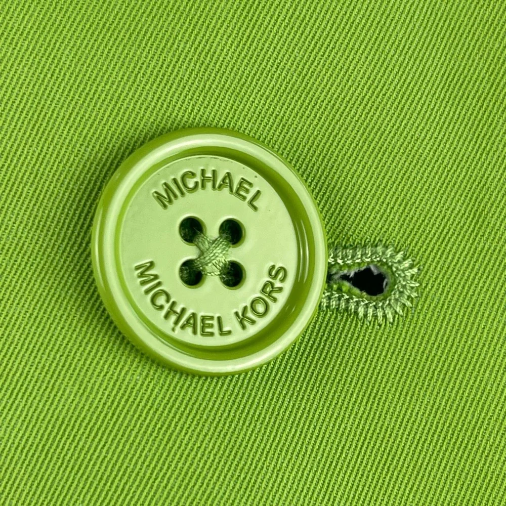 Michael Kors command attention